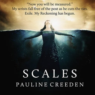 A woman standing in the deep waters with her head above the surface.